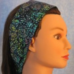 Headband in navy with aqua, purple & green batik - side