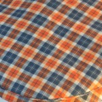 Flat Cap in Orange Navy Plaid - closeup