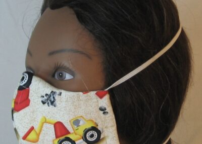 Face Mask Dig it Trucks Red Yellow on Cream-left