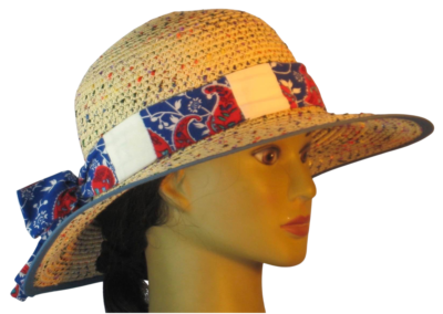 Patchwork floppy hat band made from red, blue, and white prints, styled on a hat.