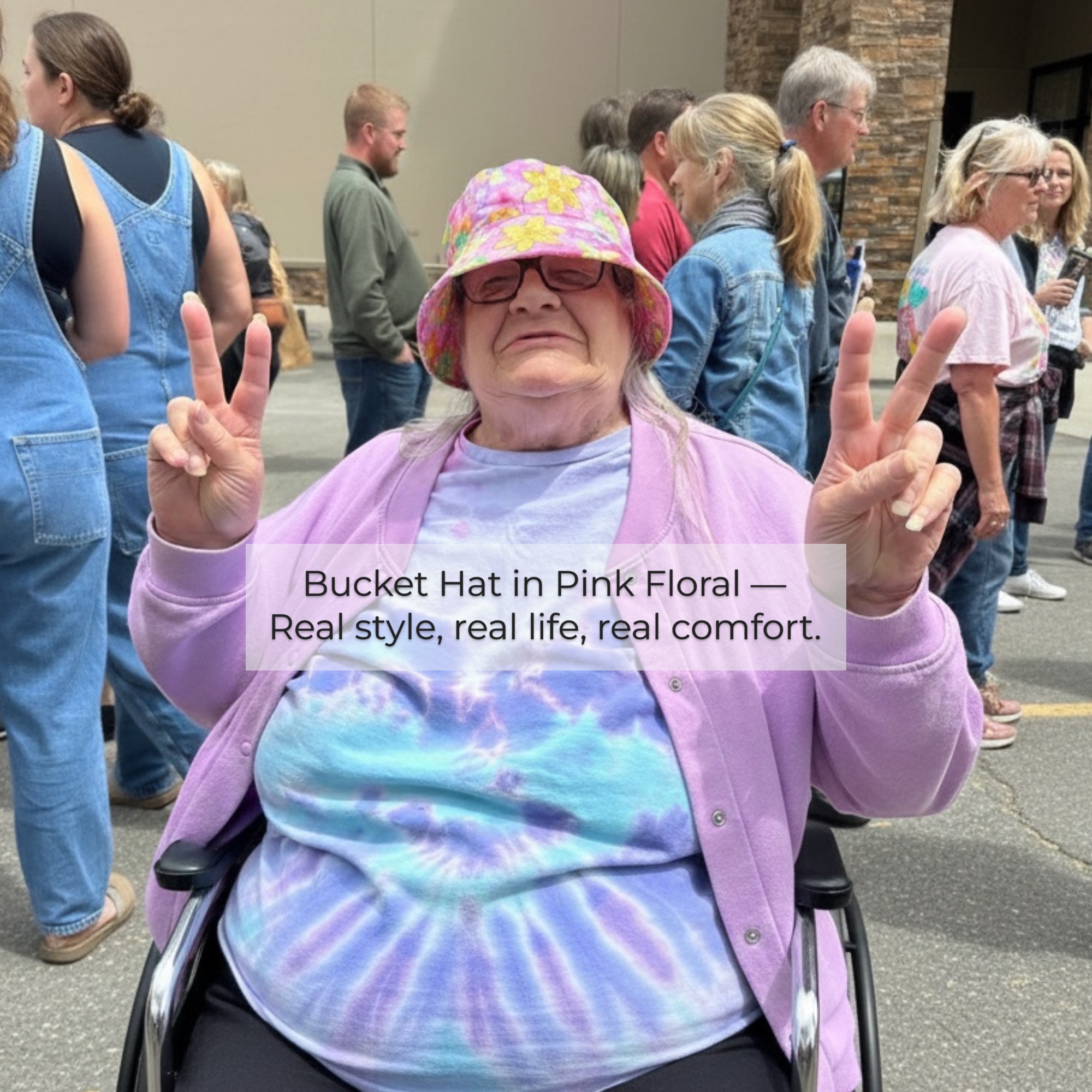Floral Bucket Hat – Festival Style Woman wearing a floral bucket hat at an outdoor festival on a sunny day.