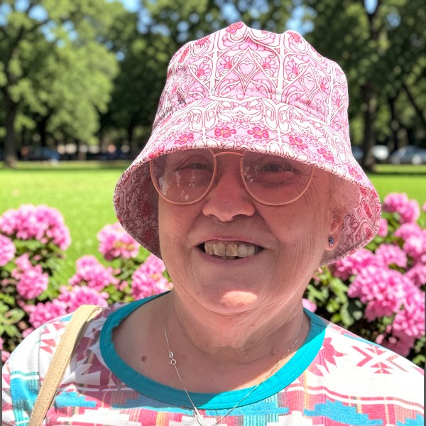 Bucket Hat in Perky Pink Posy Patch - model
